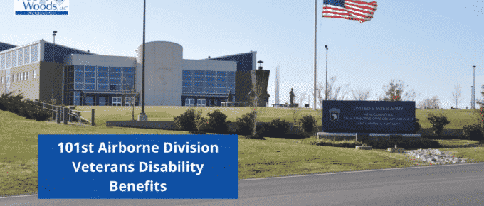 Image of the United States Army Headquarters of the 101st Airborne Division (Air Assault) in Fort Campbell, Kentucky. 101st Airborne Division Veterans Disability Benefits is the title in the lower left corner. The Woods and Woods logo is in the top left corner.