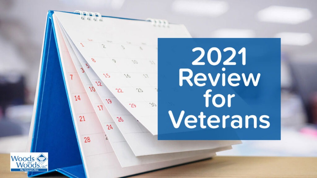 Picture of a calendar sitting on a desk in an office. Article title 2021 Review for Veterans is on the right and Woods and Woods Veteran's Firm logo is in the bottom left.