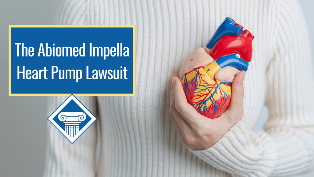 A person in a white sweater holds up a model of a human heart. Over the image is a blue box reading the page title: The Biomed Impella heart pump lawsuit