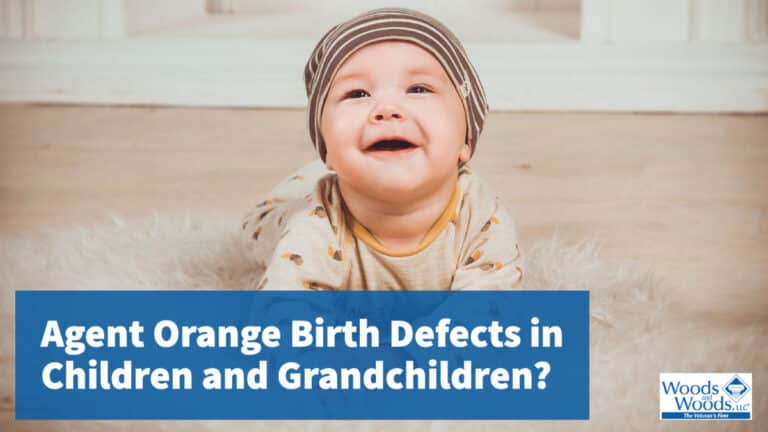 Picture of a cute baby smiling and crawling on the floor facing the photographer. Our title is low in the front: Agent Orange Birth Defects in Chilrend and Grandchildren?