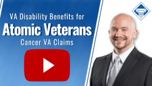 Picture of a lawyer smiling on a blue and white background with article title to the left: VA Disability Benefits for Atomic Veterans Cancer VA Claims. Youtube play button is below title.