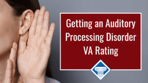 Photo of a person with their hand cupping their ear as if trying to hear something. Article title is to the right: Getting an auditory processing disorder VA rating.