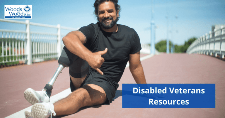 Image of a veteran with a prosthetic leg sitting on a running track making the "hang loose" gesture with his hand while smiling. Disabled Veterans Resources is the title located on the bottom right corner. The Woods and Woods logo is in the top left corner.