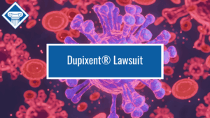 Image of a white blood cell surrounded by red blood cells with the Woods & Woods logo at the top left corner and the title of the article, "Dupixent Lawsuit" in the middle of the image in a blue box.