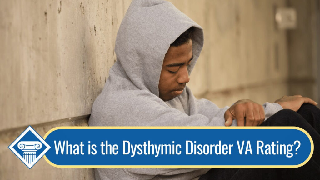 Picture of a man sitting down depressed and sulking with our title below: What is the dysthymic disorder VA rating?
