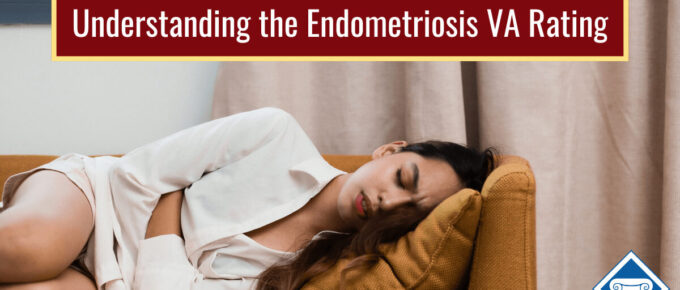 Photo of a woman lying on a couch holding her stomach in pain. Article title is across the top of the picture: Understanding the Endometriosis VA Rating