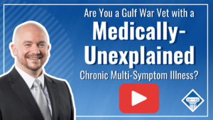 Picture of a lawyer smiling with a blue background. Article title is to the right: Are you a Gulf War veteran with a medically unexplained chronic multi-symptom illness? Youtube play button is below that.