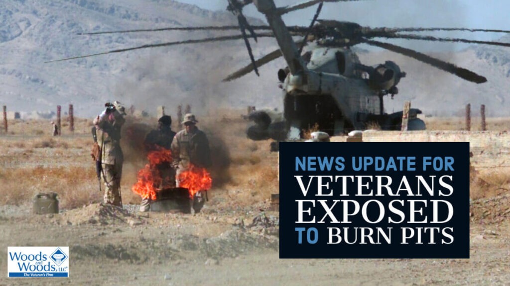 Military personnel burn latrine waste at MCAS Kandahar with a CH-53 in the background. Article title: News Update for Veterans Exposed to Burn Pits is in the bottom right. Woods and Woods logo is in the bottom left.