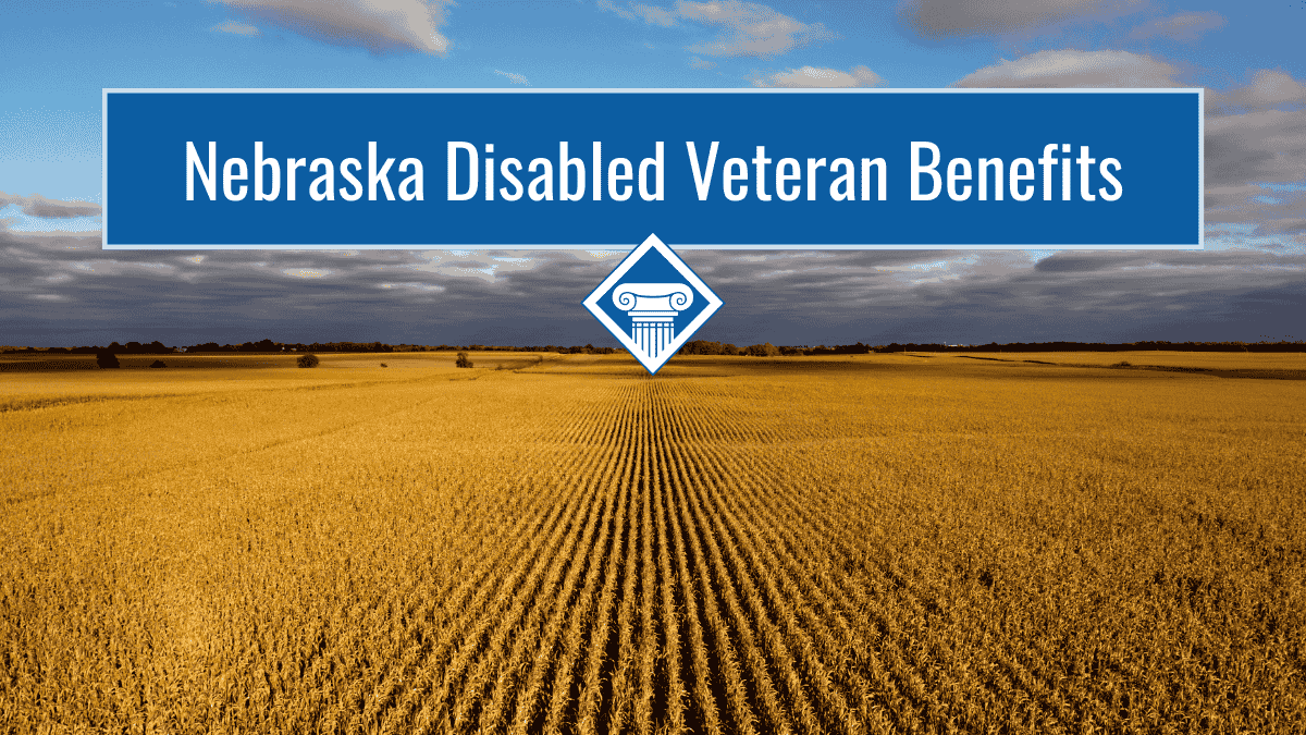 An image of a yellow field and a blue sky filled with clouds. Over the sky is a blue banner reading the article title: Nebraska disabled veteran benefits