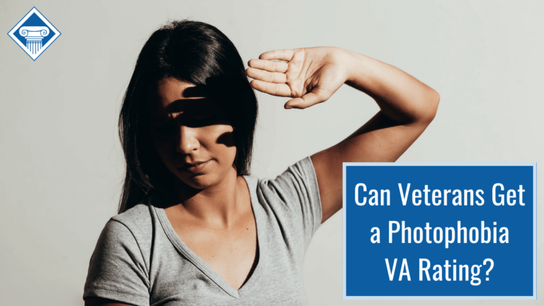 Picture of a woman with brown hair and a gray shirt is shading her eyes from the sun. Article title is in the bottom righthand corner: Can Veterans Get a Photophobia VA Rating?