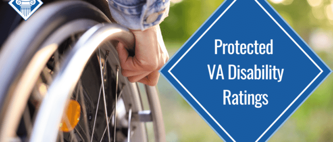 A person's hand rests on a wheelchair wheel. Over the image is a blue diamond reading the article title: Protected VA disability ratings