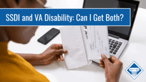 Photo of a woman sitting at a white desk looking at a check with a laptop in the background. Article title is across the top of the image: SSDI and VA Disability: Can I Get Both?