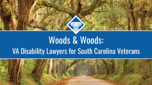 Southern live oak trees create a tunnel over a road. Over the image is a blue banner reading the article title: VA disability lawyers for South Carolina veterans