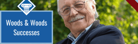 A man smiling at the camera with the text: Woods & Woods Successes