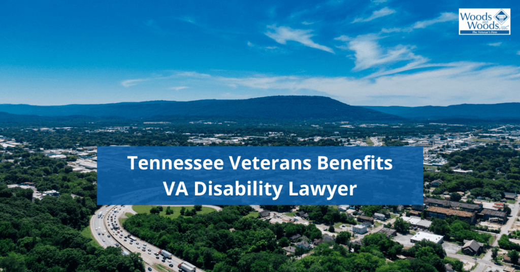 Image of an aerial view of Chattanooga, Tennessee. Our title is Tennessee Veterans Benefits VA Disability Lawyer in the lower center and the Woods and Woods logo is in the upper right corner.