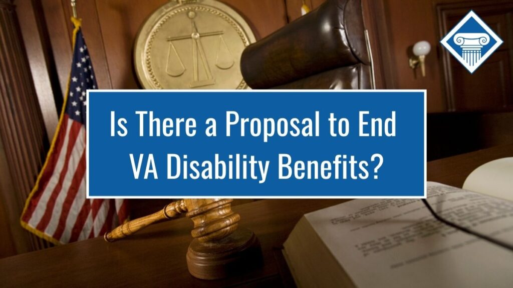 Closeup photo of a table in a courtroom with an open book and a gavel sitting on top. A large brown chair, an American flag, and a golden plaque engraved with the Scales of Justice are behind the table. Article title is across the middle of the photo: Is there a proposal to end VA disability benefits?