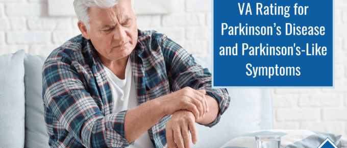 White-haired man in a plaid shirt is looking down at his left wrist, holding it with his right hand. Article title is to the right: VA Rating for Parkinson's Disease and Parkinson's-Like Symptoms