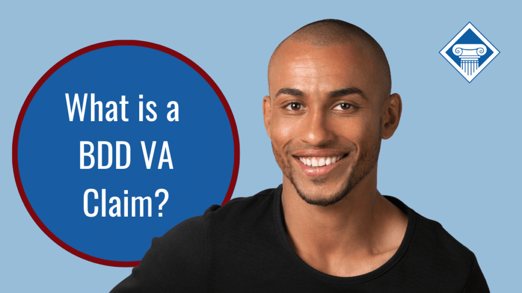 A young man with a close-cropped beard and hair smiles at the camera in front of a light blue background. Next to him is a bubble reading the article title: What is a BDD VA claim?