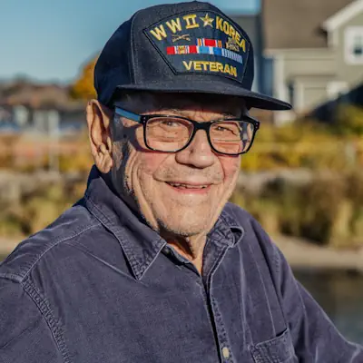 WWII vet smiling for the camera.
