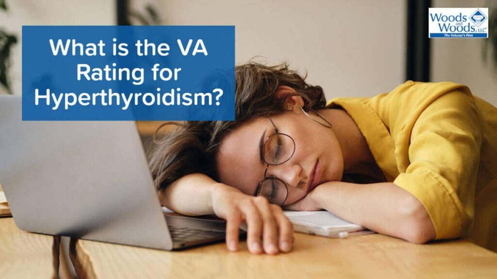 Woman wearing glasses and a yellow shirt who has fallen asleep on top of her laptop computer. Article title is on the left: What is the VA rating for hyperthyroidism?