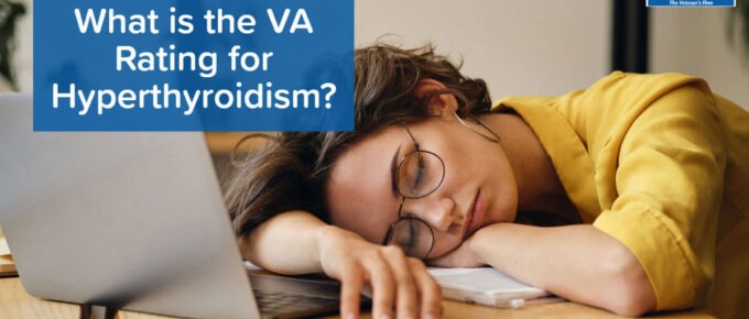 Woman wearing glasses and a yellow shirt who has fallen asleep on top of her laptop computer. Article title is on the left: What is the VA rating for hyperthyroidism?