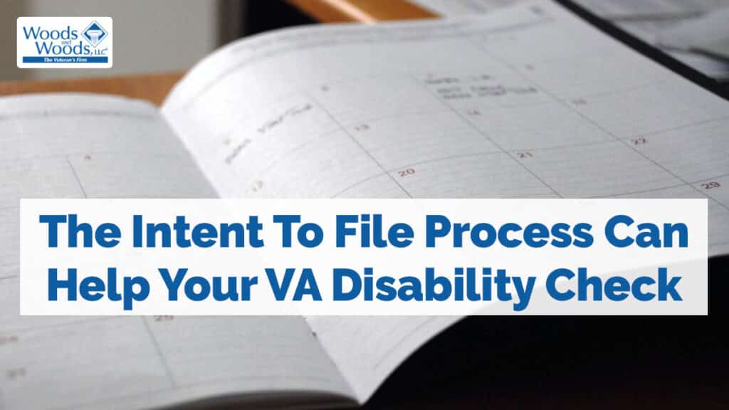 A calendar that is open with dates barely visible. Our title is in front: Intent to File process can help your VA disability check
