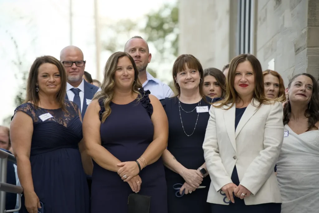 Leadership team gathered for the ceremonial opening of our new building.